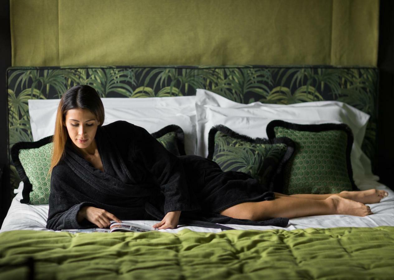 Velona'S Jungle Luxury Suites ฟลอเรนซ์ ภายนอก รูปภาพ